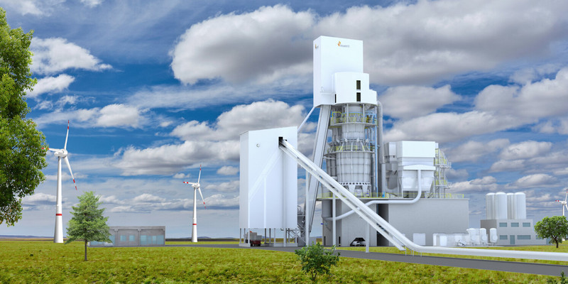 Vertical lime kiln with tall concrete towers.